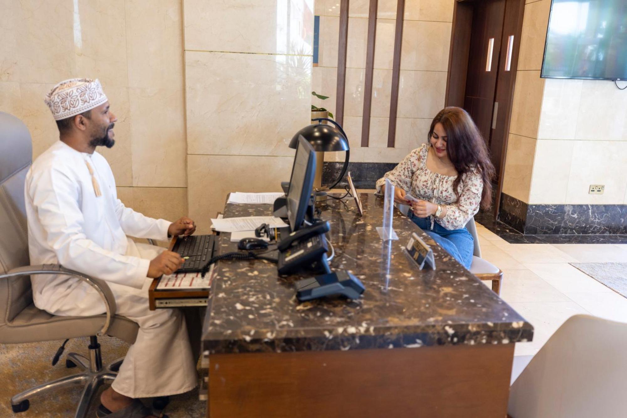 Millennium Resort Salalah Esterno foto A hotel receptionist in Oman